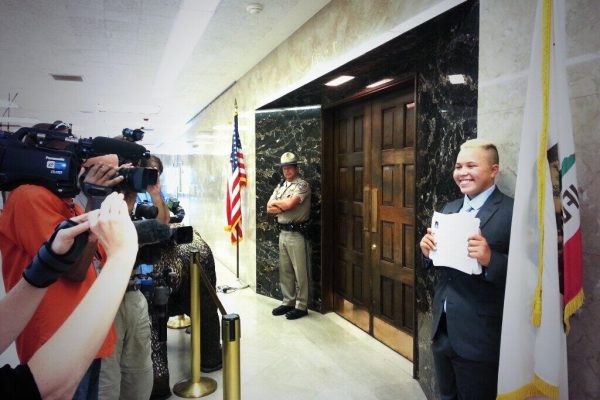 Ashton Lee delivering petitions to Gov. Brown