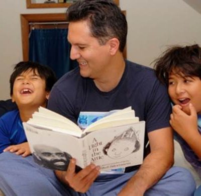 Abdi Soltani reads his "A Light in the Attic" to his two sons