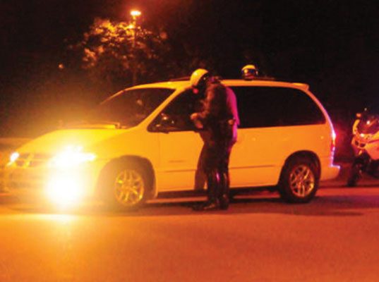 Cop pulling someone over