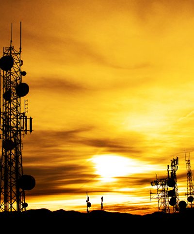 cell phone tower at sunset