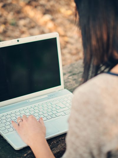 Person on laptop via Shutterstock
