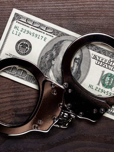 money with handcuffs