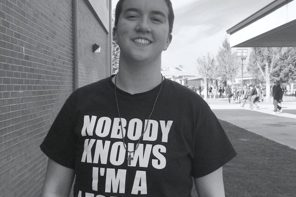 ACLU client Taylor Victor wearing t-shirt at school that reads "Nobody Knows I'm a Lesbian"