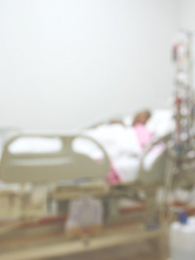 person in hospital bed