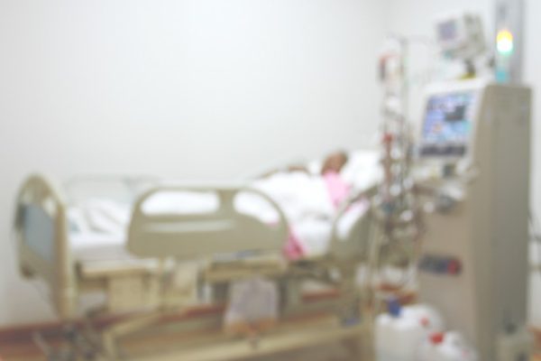person in hospital bed