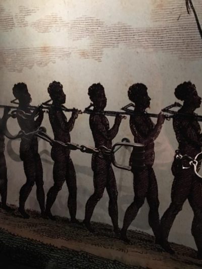 mural of chained enslaved people