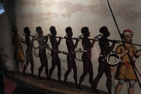 mural of chained enslaved people