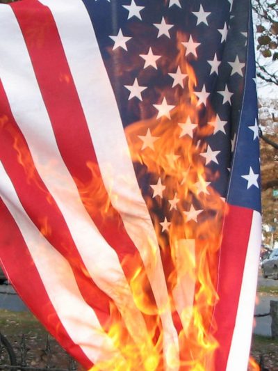 United States flag being burnt in protest, in New Hampshire on the eve of the 2008 election.