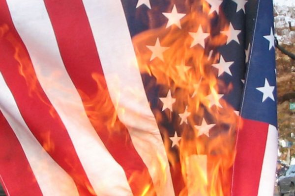 United States flag being burnt in protest, in New Hampshire on the eve of the 2008 election.