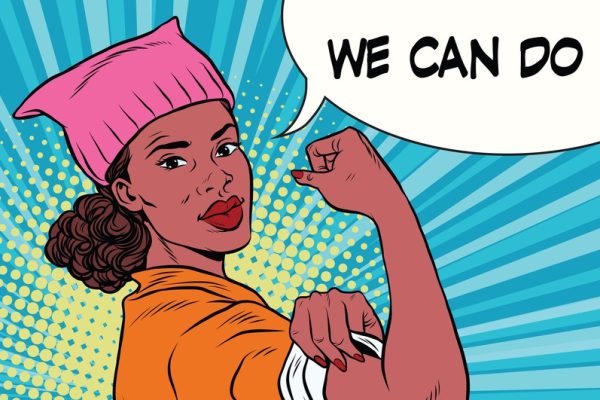 An illustration of a black woman wearing a pink hat from the women's march, flexing her arm, with a speech bubble that says "WE CAN DO IT!"