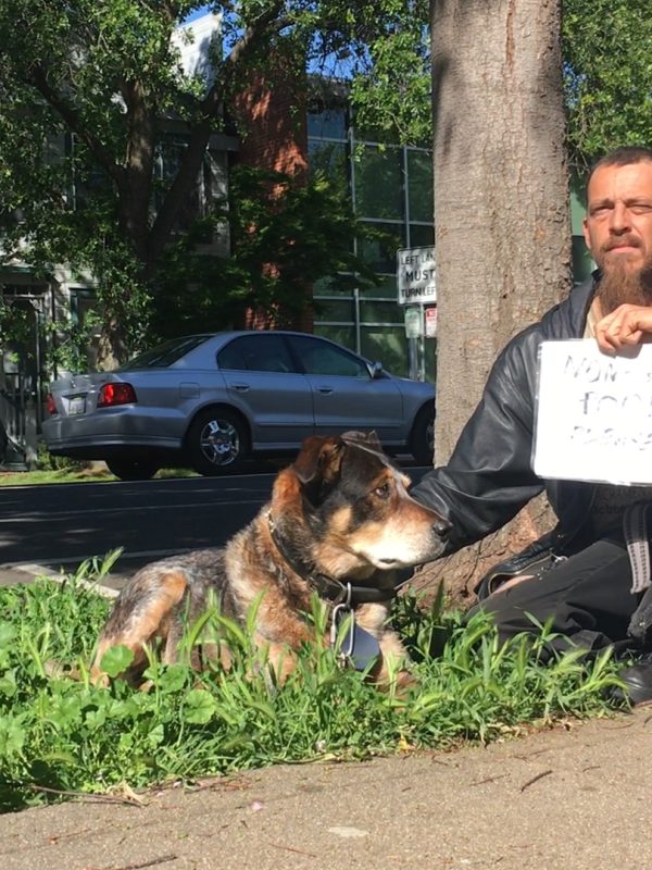 Client Faygo Clark with his sign