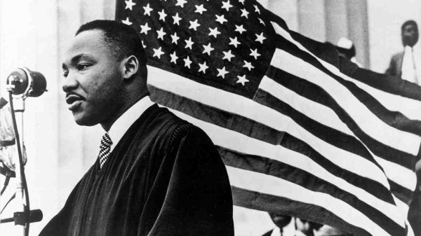 MLK with American flag