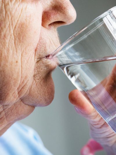 shutterstock image of person drinking water