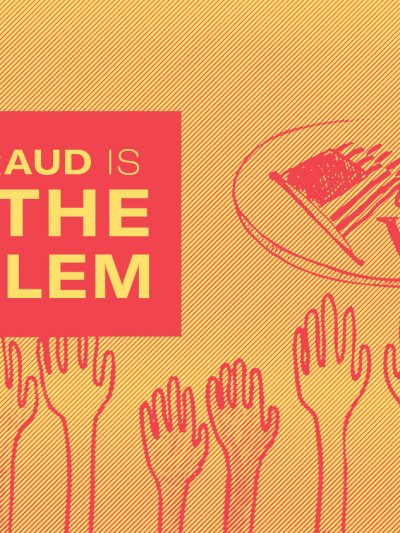 Hands raised in the air to vote