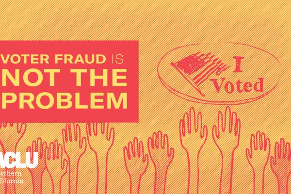 Hands raised in the air to vote