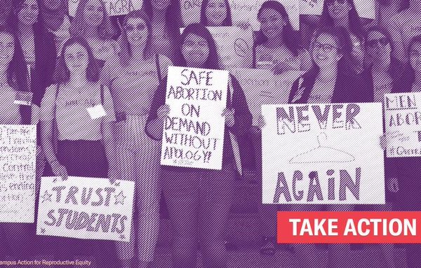 students with signs supporting abortion