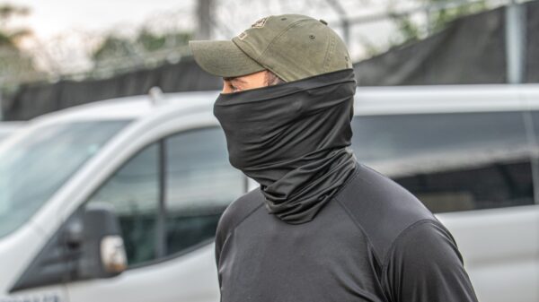 masked immigration agent