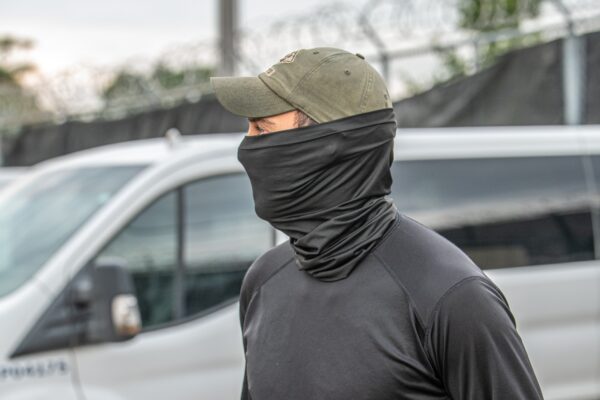 masked immigration agent