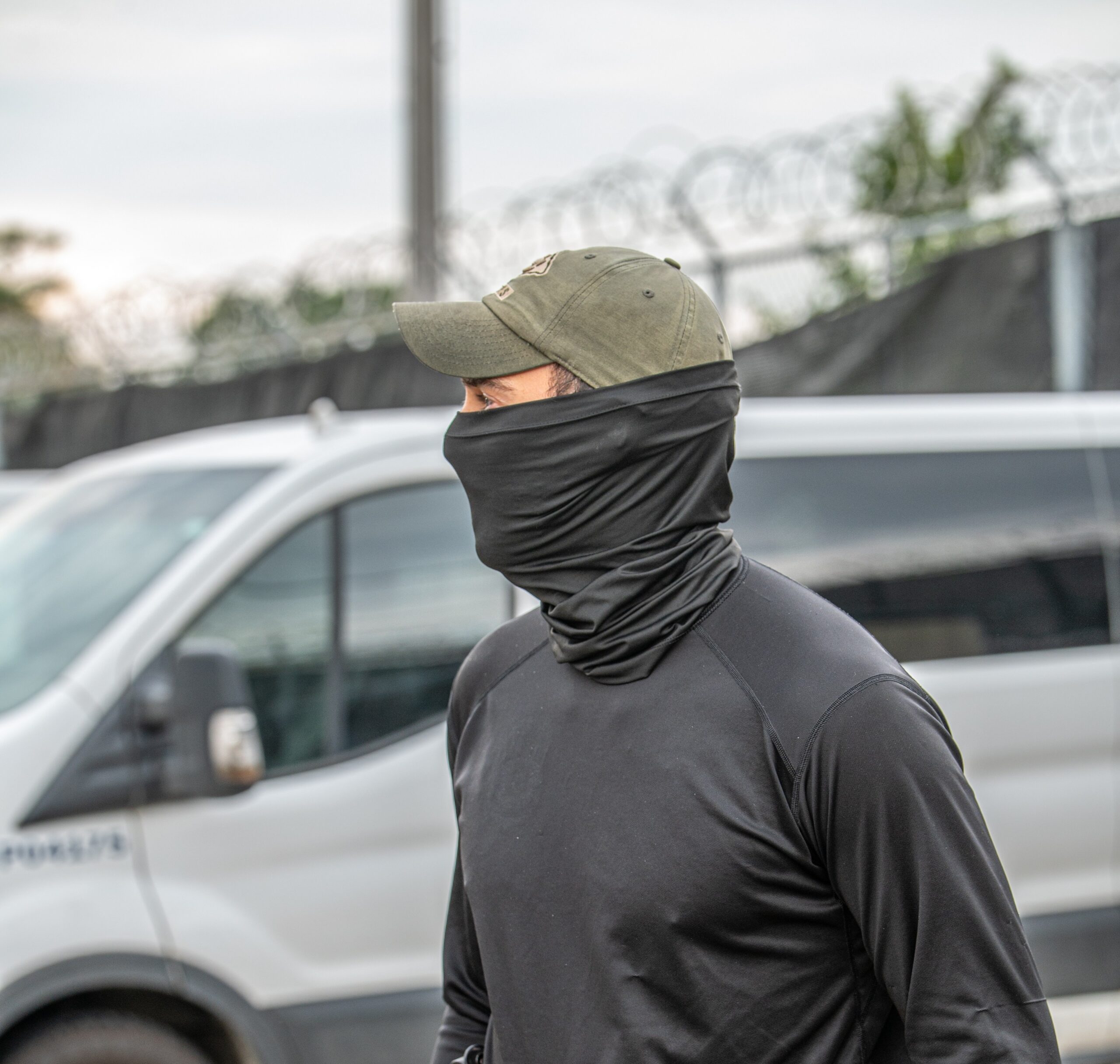 masked immigration agent