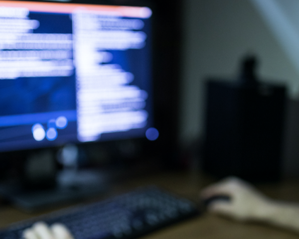 man looking at computer