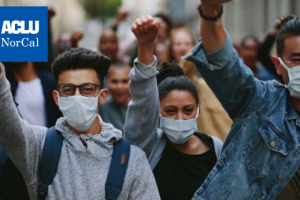 young people wearing masks protesting