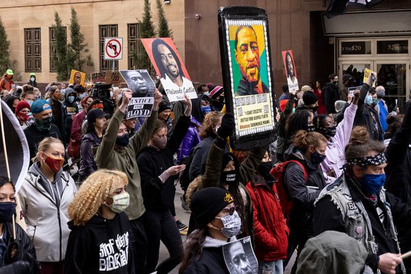 Protesters rally in downtown Minneapolis on the day of the Derek Chauvin murder trial