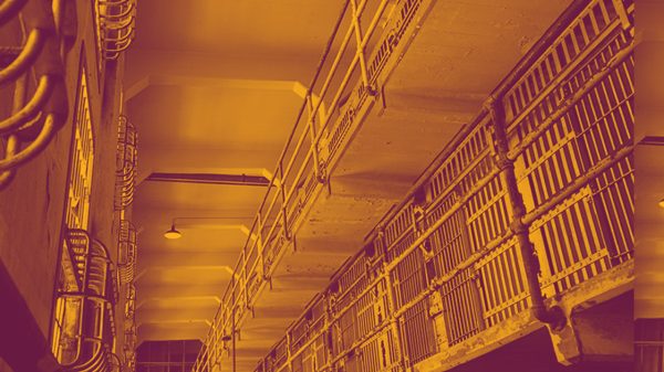 interior of a jail with light orange and dark burgandy overlaid