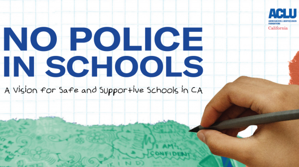 a hand holding a pen on the right and text that reads 'No Police In Schools'