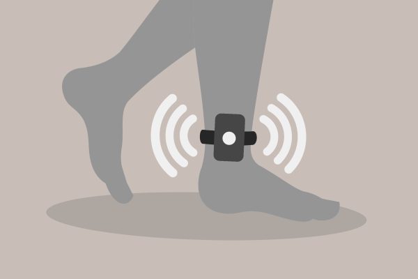 Illustration of an ankle monitor strapped to a person's leg.