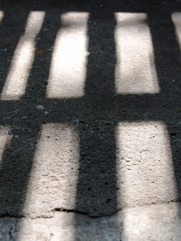 shadow of prison bars on the floor