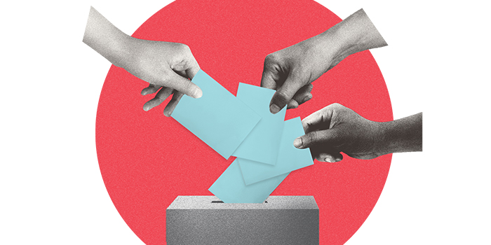 hands casting ballots