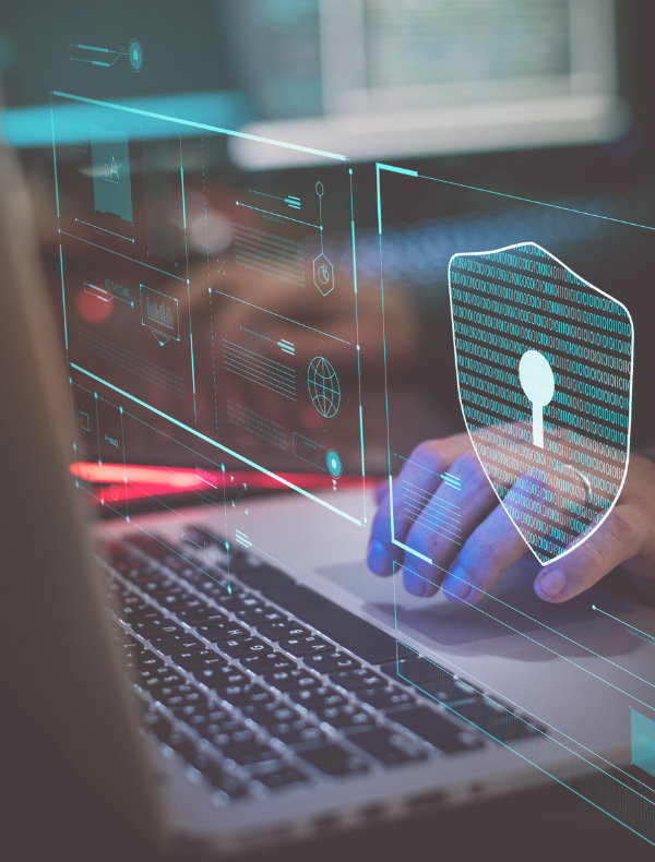 hand typing on laptop with keyhole symbol