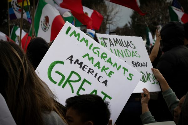 Signs at a protest against the deportation of immigrants