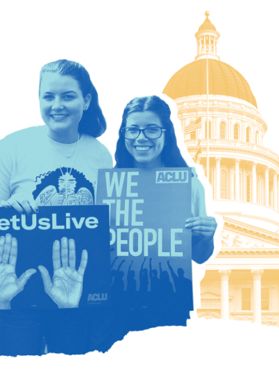 two activists with signs by california state capitol