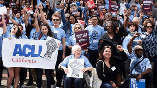 A group of cheering ACLU California volunteers