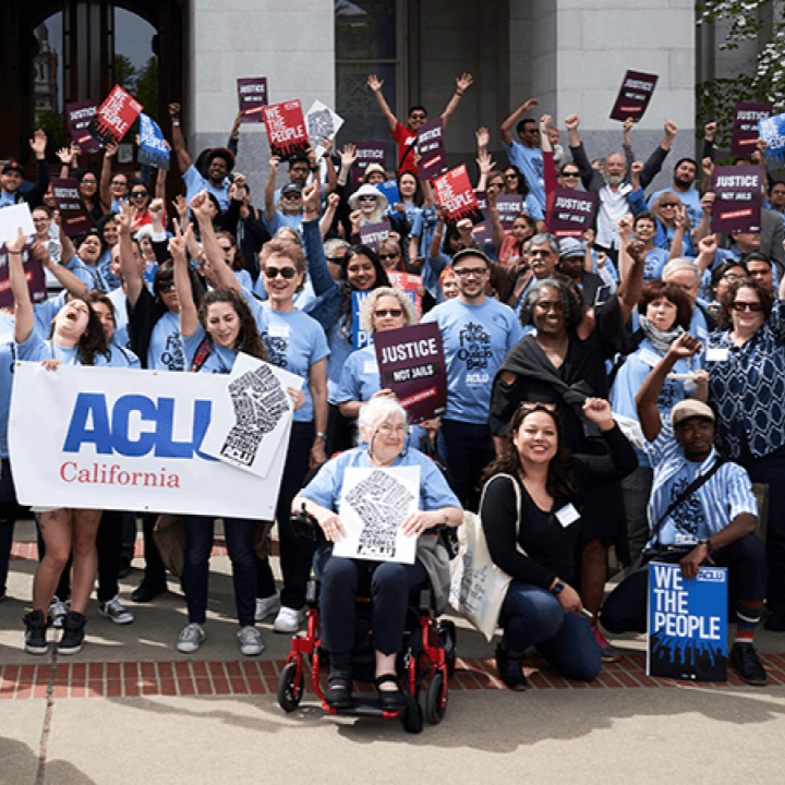 A group of cheering ACLU California volunteers