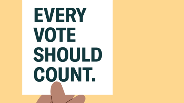 hand holding a note card saying "every vote should count"