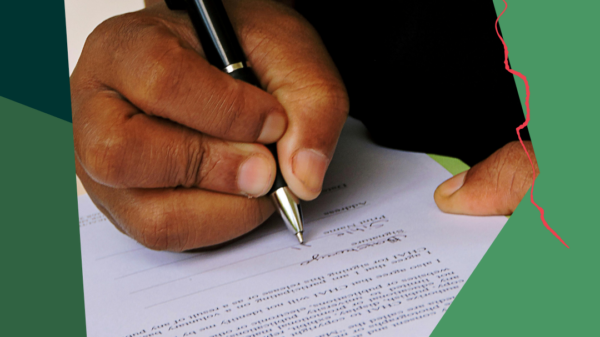 Thumbnail of person signing a document