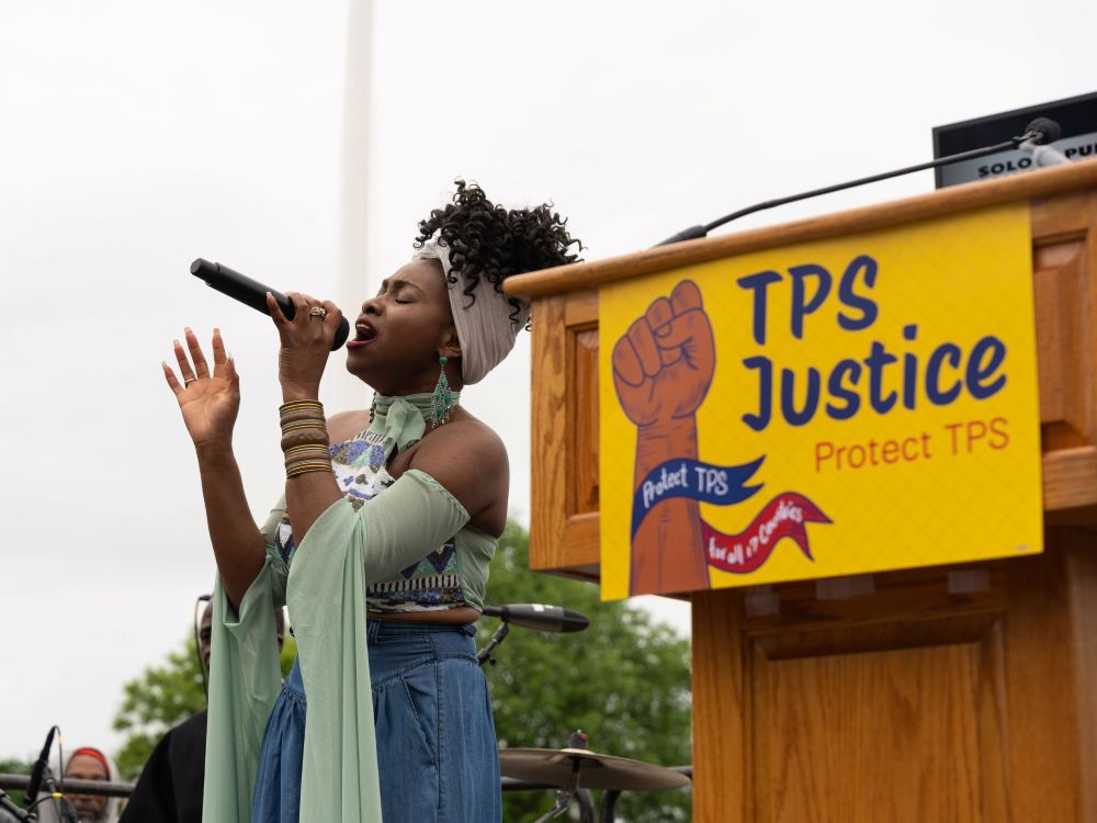 Singer at TPS rally