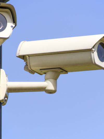 An automatic license plate reader on a pole.