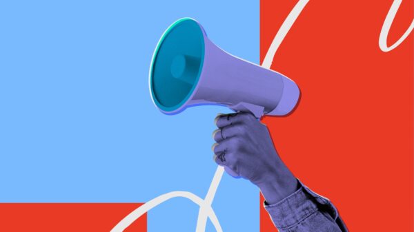 graphic of hand holding megaphone on red and blue background